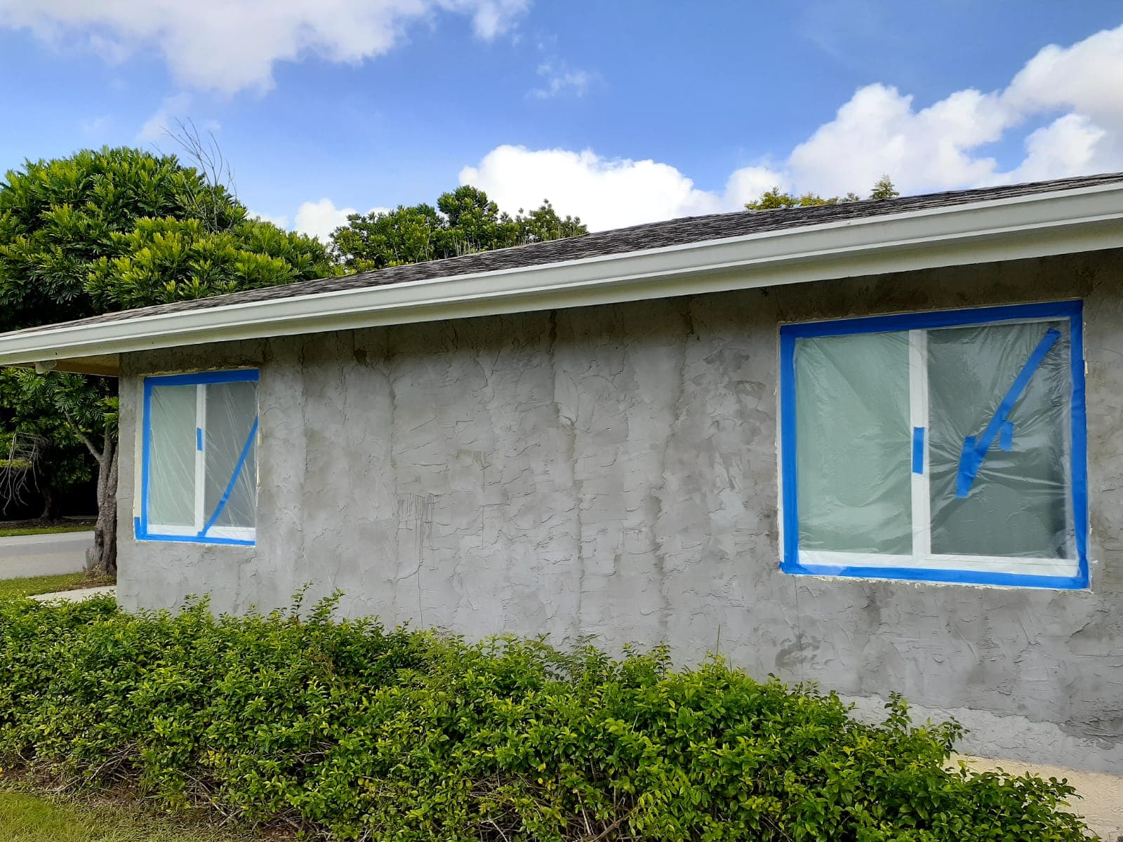Condo exterior with stucco finish